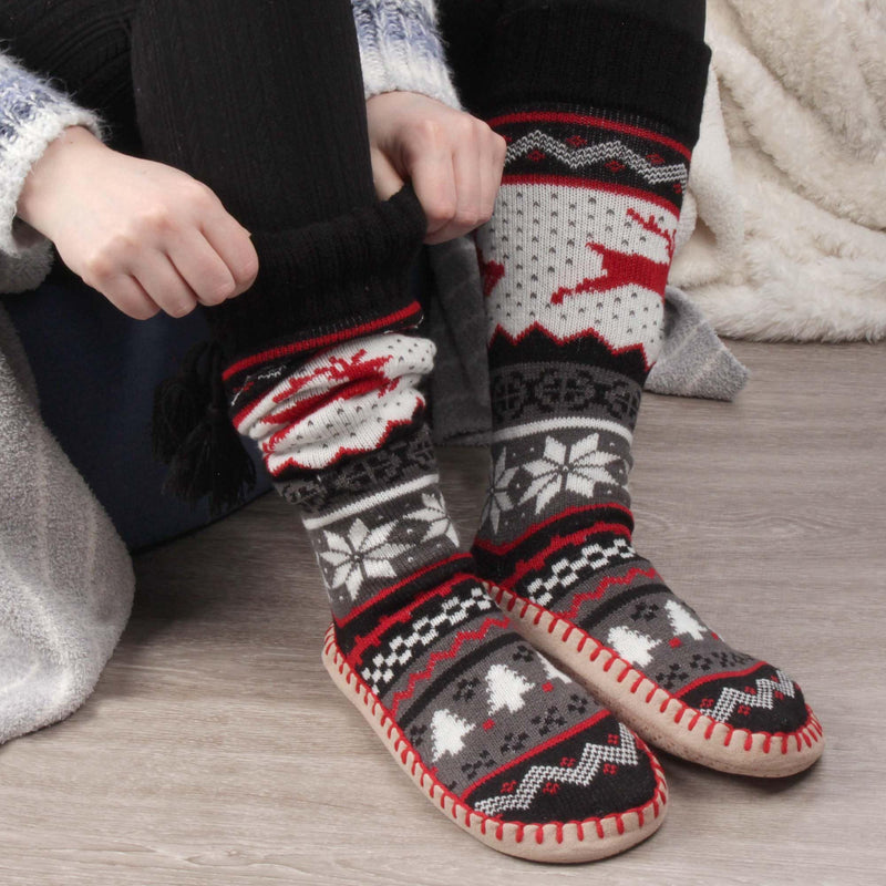 Putting on fuzzy slipper socks