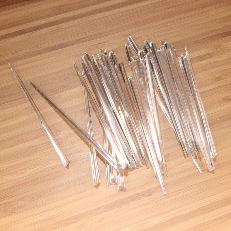 3.5" clear prism plastic skewer picks on bamboo wood